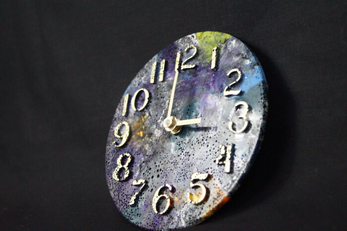 Clock made from recycled material